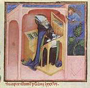 San Agustn sentado en el scriptorium. Miniatura. Annimo del siglo XV. Ms Vat. Lat. 451 (II parte), fol. 1r.