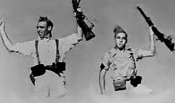 Robert Capa (izquierda) y Federico Borrell, "Taino". Detalle de "Milicianos de Cerro Muriano" (DG-3)