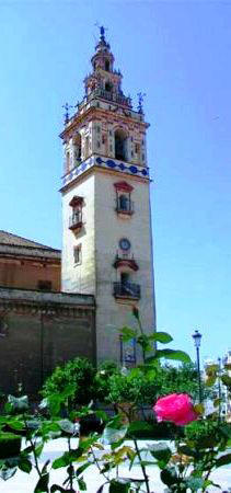 Parecía, de cerca, como una Giralda vista de lejos, y mi nostalgia de ciudades, aguda con la primavera, encontraba en ella un consuelo melancólico.(Iglesia de la Granada, en Moguer - HUELVA ) I